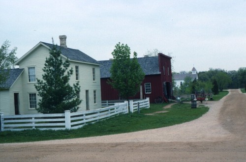 New England's influence is seen in the 1880s village. The red building is the blacksmith shop.